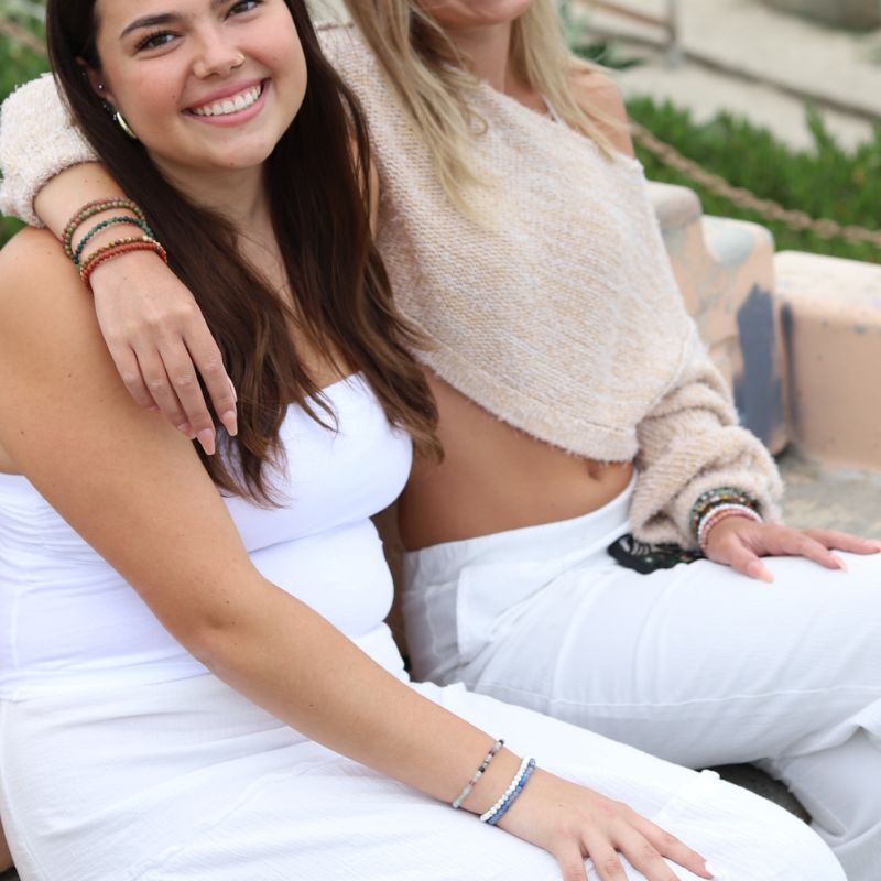 Women wearing dainty Fluorite Amethyst and Aventurine Bracelet Set for best friends