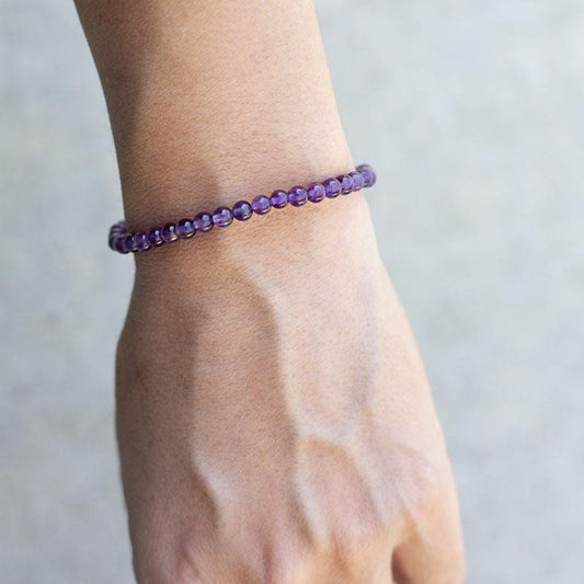 Woman wearing dainty Amethyst Bracelet