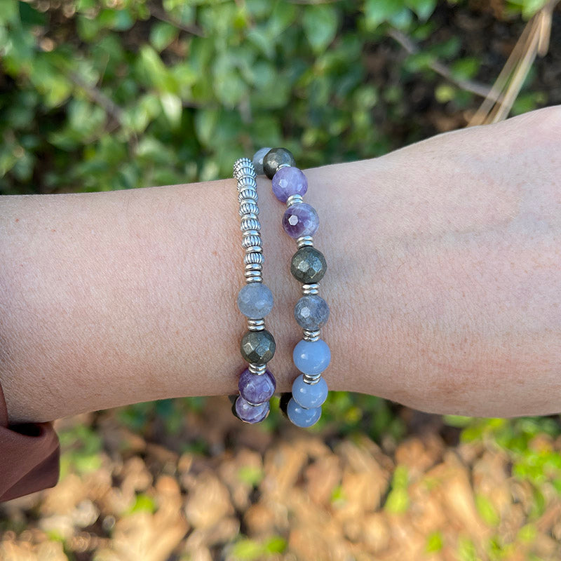 Model wearing Angelite and Amethyst Wrist Mala Bracelet