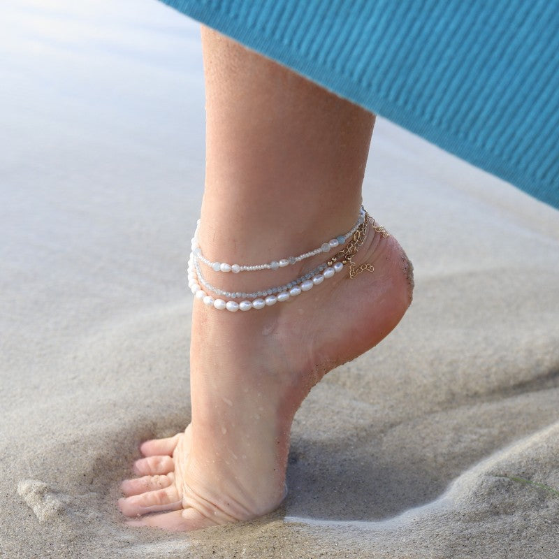 Woman wearing Aquamarine and Luxury Anklet