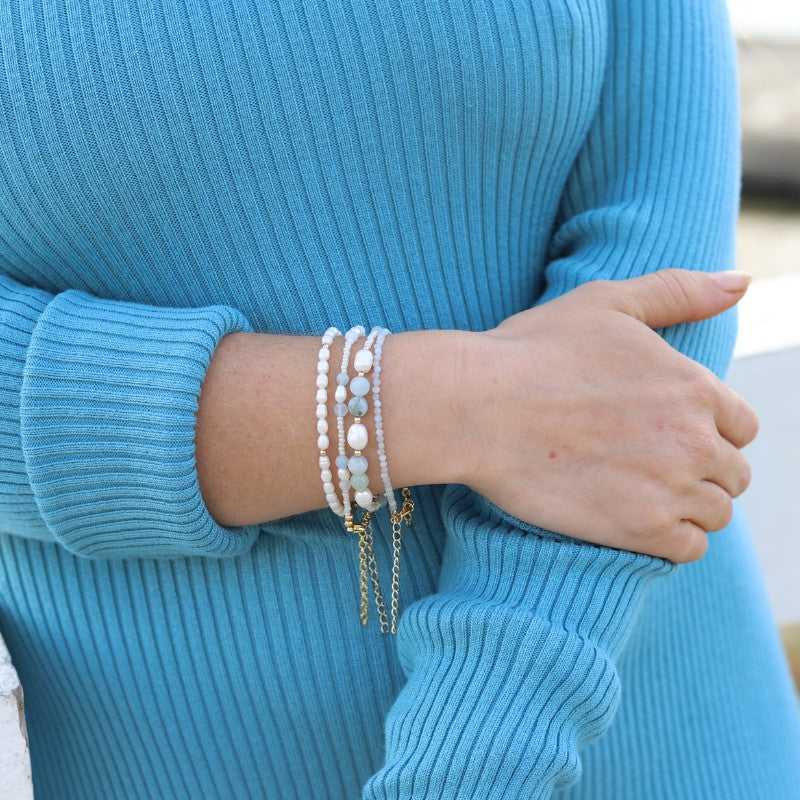 Woman wearing Aquamarine and Pearl Bracelet