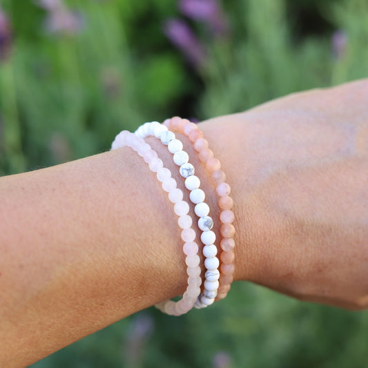 Howlite Rose Quartz and Sunstone Dainty Bracelet on hand model