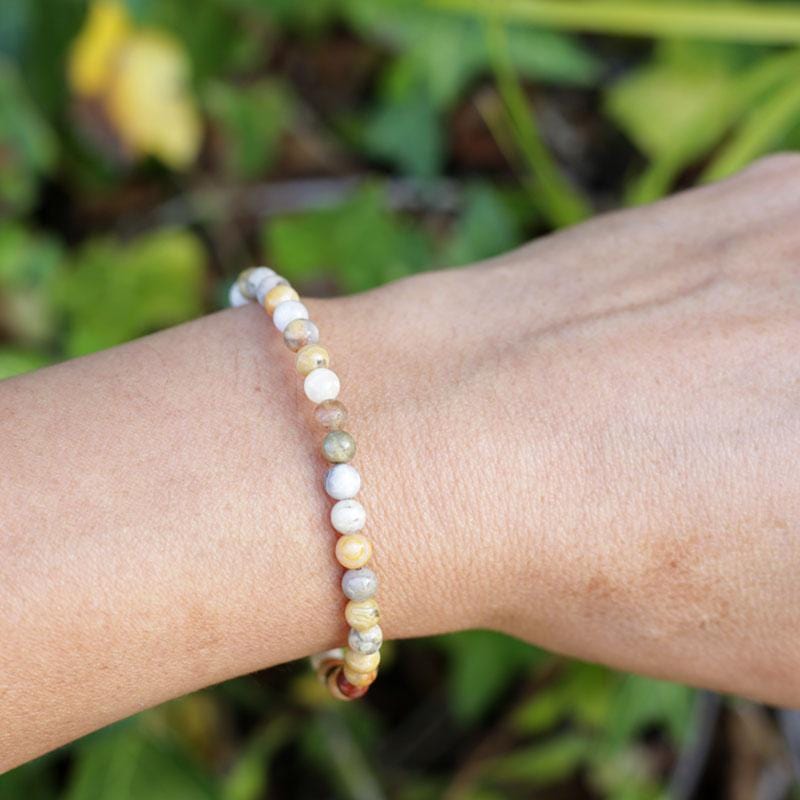 Woman wearing dainty Crazy Lace Agate Delicate Bracelet bracelet