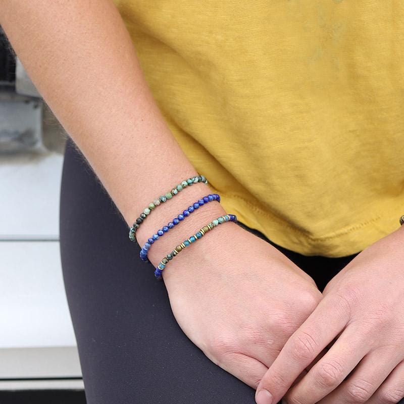 Woman wearing dainty Fluorite Amethyst and Aventurine bracelet