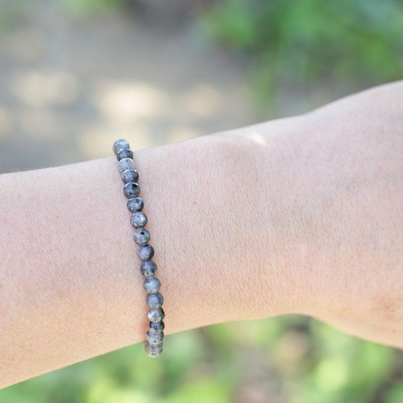 Woman wearing dainty Larvikite Delicate Bracelet