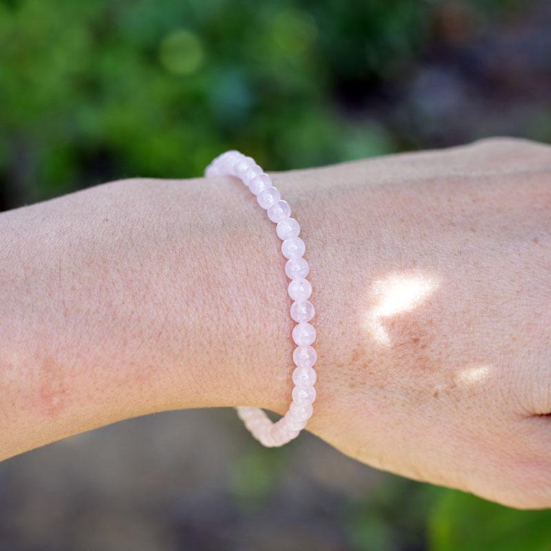 Woman wearing dainty Rose Quartz bracelet