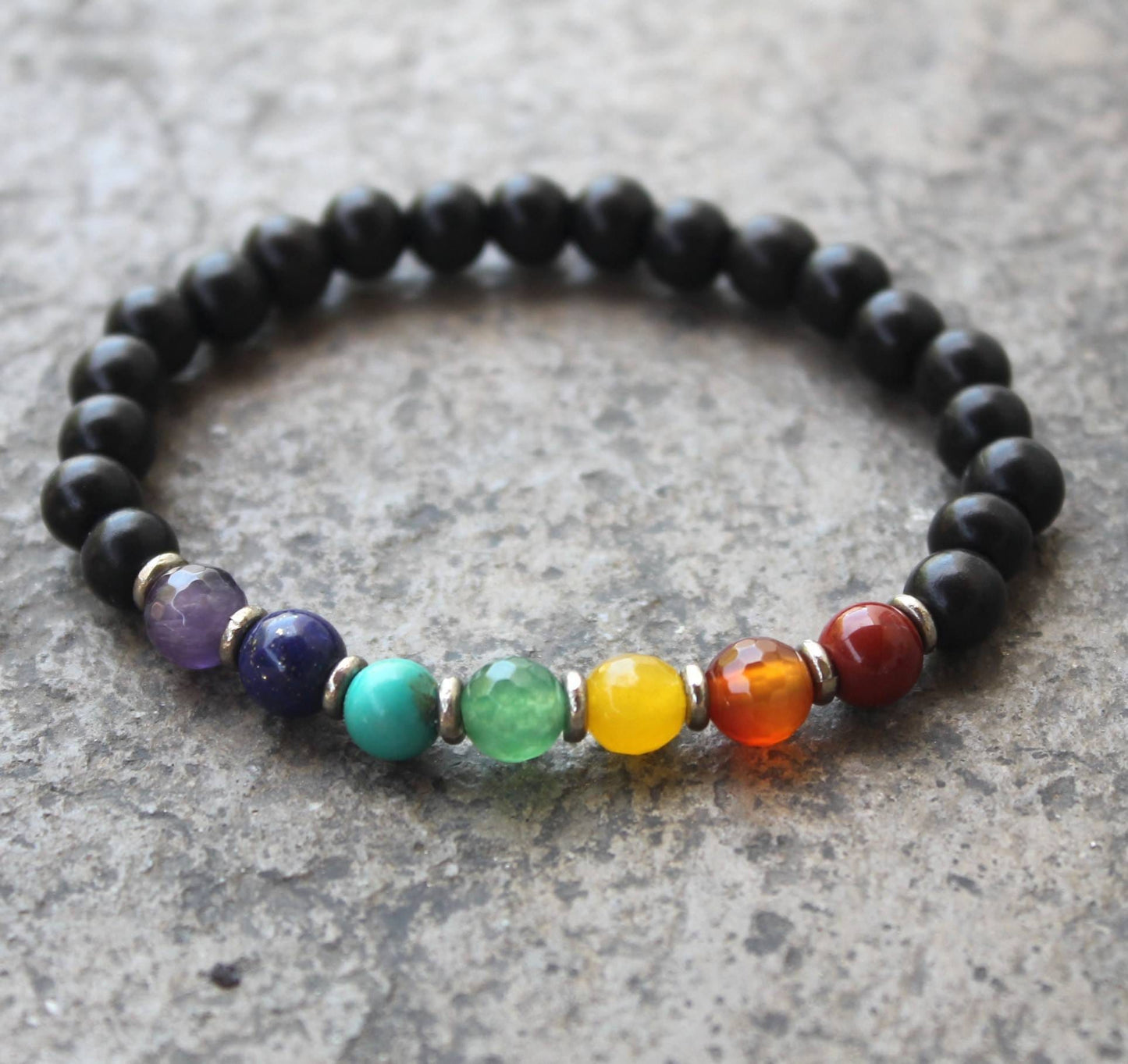 Chakra bracelet made up with ebony and chakra gemstones