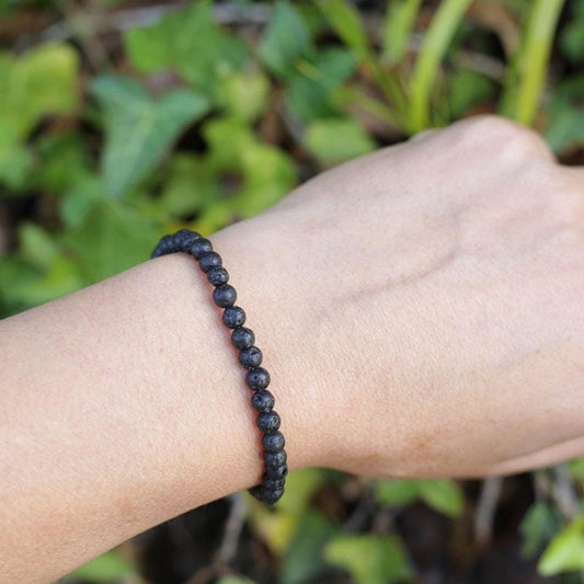 Woman wearing dainty Lava Bracelet